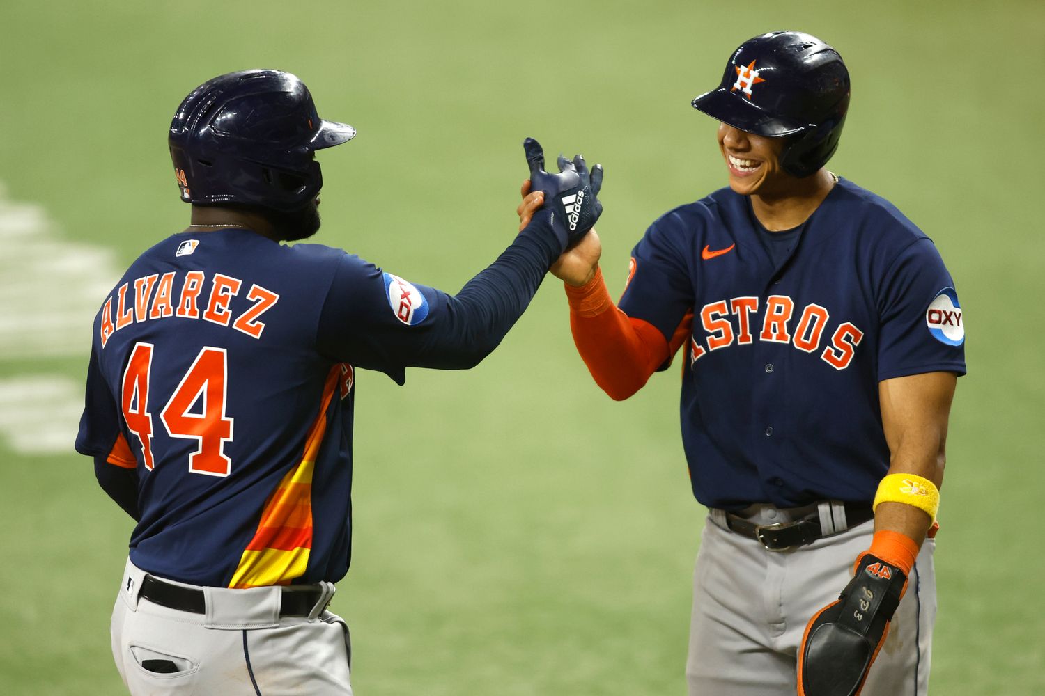 Sep 5, 2023; Arlington, Texas, USA;Houston Astros designated hitter Yordan Alvarez (44) and shortstop Jeremy Pena (3) celebrate a two run home run in the seventh inning against the Texas Rangers at Globe Life Field. Mandatory Credit: Tim Heitman-USA TODAY Sports  